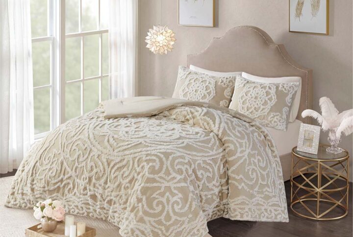 The Madison Park Laetitia Tufted Cotton Chenille Medallion Comforter Set provides an alluring shabby chic update to your bedroom. This globally inspired comforter features a 100% cotton face and reverse with a tufted chenille medallion centered on top of the bed. The 2 matching shams (1 in Twin/Twin XL) coordinate with the cotton comforter to complete the boho look. Perfect for all season use