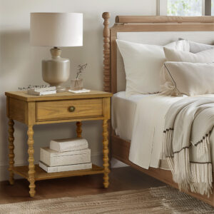 Complement your bedroom space with the Madison Park Signature Beckett Nightstand. This nightstand table features a camel oak finish to create a warm and inviting look. A single drawer and lower shelf provide plenty of space for your bedside essentials. The turned solid wood legs add an elegant accent