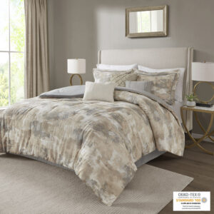 Modernize your bedroom decor with the chic styling of the Madison Park Beacon 7 Piece Comforter Set. This luxurious comforter features an abstract print in various gray