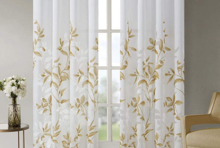 Transform any room with the beauty of our Madison Park Cecily Printed Window Panel. The gorgeous panel flaunts a stunning all over yellow botanical design burned out for a dimensional and fresh update. Finished with silver grommet tops for easy hanging