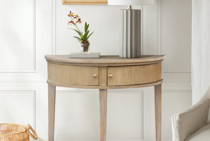 Martha Stewart’s Bedford Home serves as the inspiration for the farmhouse charm of the Crestview Storage Console Table. Flaunting a demilune shape