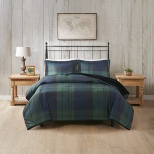 Wrap yourself in warmth and comfort with the Woolrich Bernston faux wool to faux fur down alternative comforter set. This set features a faux wool face with a printed plaid pattern