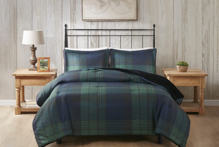 Wrap yourself in warmth and comfort with the Woolrich Bernston faux wool to faux fur down alternative comforter set. This set features a faux wool face with a printed plaid pattern