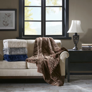 Keep yourself warm and cozy with this oversized Parker plush down alternative throw. This throw features an ultra-soft ribbed plush face with a solid plush reverse