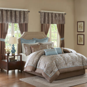 The Madison Park Essentials Brystol 24 Piece Room in a Bag provides a total makeover for your bedroom decor. This traditional comforter flaunts a soft blue and taupe jacquard paisley pattern with an accenting solid brown border to create a luxurious glam look. Matching pillow shams and solid soft blue Euro shams with 2-inch flanges coordinate beautifully with the elegant comforter. A solid brown bed skirt and 4 decorative pillows with embroidery and pleating details add the finishing touches to this paisley bedding set. Hypoallergenic polyester filling in the comforter and pillows contains no allergens and is treated to be dustproof. A 4 Piece sheet set is also included to complement the comforter and complete the jacquard bedding set. To elevate your bedroom