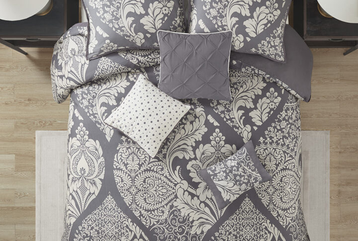 The Madison Park Vienna 6 Piece Printed Duvet Cover Set offers an eye-catching update to your bedroom decor. A beautifully intricate damask pattern is flaunted across the duvet cover and shams