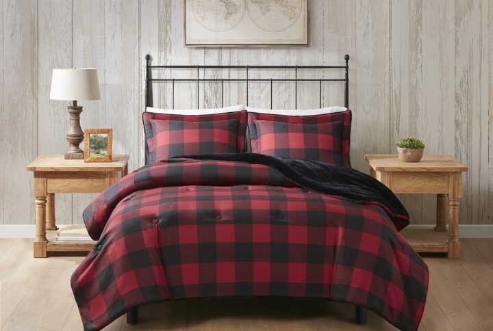 Wrap yourself in warmth and comfort with the Woolrich Bernston faux wool to faux fur down alternative comforter set. This set features a faux wool face with a printed plaid pattern