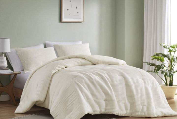 The Wyatt jersey comforter set features a unique knitted striped pattern in various widths for a modern look. Its soft texture and pieced heathered fabric add a casual and contemporary feel to your bedroom