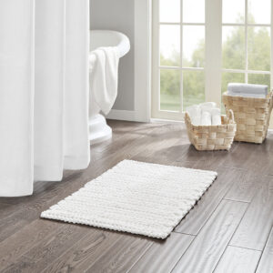 The Madison Park Lasso 100% Cotton Chenille Chain Stitch Rug provides a soft textural update to your bathroom decor. This cotton chenille bath rug features a woven chain stitch design that creates dimension and texture