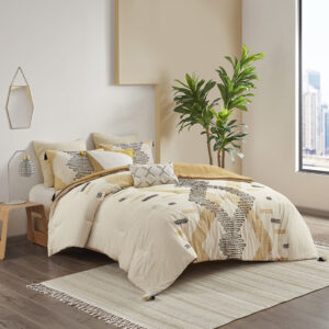 The INK+IVY Arizona 3 Piece Cotton Comforter Set offers a shabby chic update to your bedroom. This 100% cotton comforter features a yellow and grey geometric print with twisted yarn embroidery