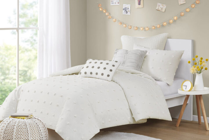 The Urban Habitat Brooklyn Cotton Jacquard Comforter Set features small tufted chenille dots that create a fresh shabby chic look. This comforter set brings a soft and charming update to your bedroom