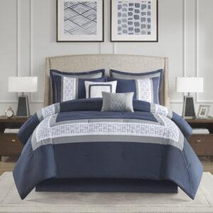 510 Design presents the Powell 8 Piece Embroidered Comforter Set to elevate your bedroom decor. This hotel style navy comforter features an embroidered and pieced border for a sophisticated and elegant design that easily coordinates with your space. The matching pillow shams also flaunt beautiful embroidery details