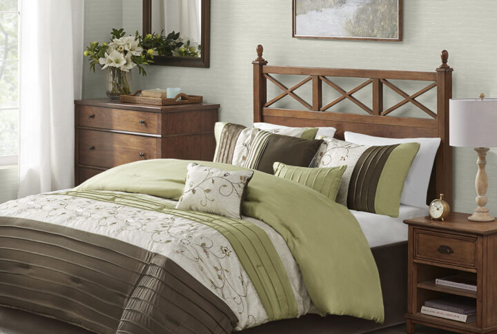 The Serene Bedding Collection provides an elegant look to your home. The top of the comforter is a mix of green