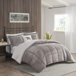 Bring the warmth and comfort of a cabin retreat to your bedroom with the Woolrich Alton Plush to Sherpa Down Alternative Comforter Set. Made from ultra-soft plush and reversing to a cozy berber