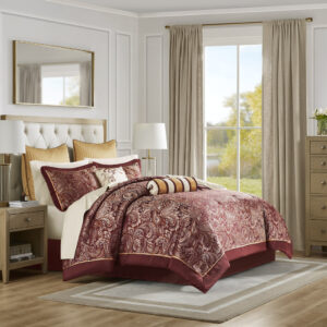 Give your bedroom a classic and elegant look with the Madison Park Aubrey 12 Piece Complete Bed Set including cotton bed sheets. This stunning set features a jacquard weave with a modern paisley pattern in a burnt red