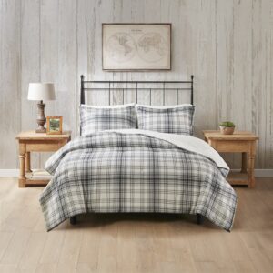 Wrap yourself in warmth and comfort with the Woolrich Bernston faux wool to faux fur down alternative comforter set. This set features a faux wool face with a printed plaid pattern