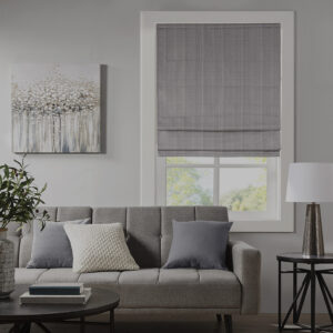 The Madison Park Galen Basketweave Cordless Total Blackout Roman Shade Collection offers an simple and convenient elevates to your home decor. This tonal grey roman shade features a basket weave texture base fabric that creates a natural look and feel. A thermal foambacking on the reverse provides energy efficiency and maximum privacy; light will come through slightly from stitch due to the nature of basketweave fabric. The cordless retraction mechanism makes it easy to open and close the window shade throughout the day