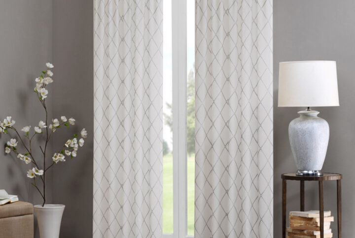 Madison Park’s Irina Diamond Sheer Window Curtain provides an alluring update to your home. An elegant diamond pattern is beautifully embroidered on a soft sheer fabric