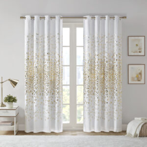 Add a touch of glam to your room with the Intelligent Design Lillie Grommet Top Metallic Animal Printed Total Blackout Curtain. A gold metallic animal print shines on the ultra-soft brushed white microfiber fabric to create a fun and glam modern look; while the 2 Pass foamback total blackout liner provides a thermal energy efficient barrier that helps block any exterior light and noise intrusion