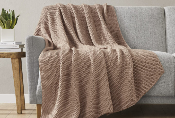 Bundle up in the warm and cozy comfort of the INK+IVY Bree Knit Throw. This ultra-soft