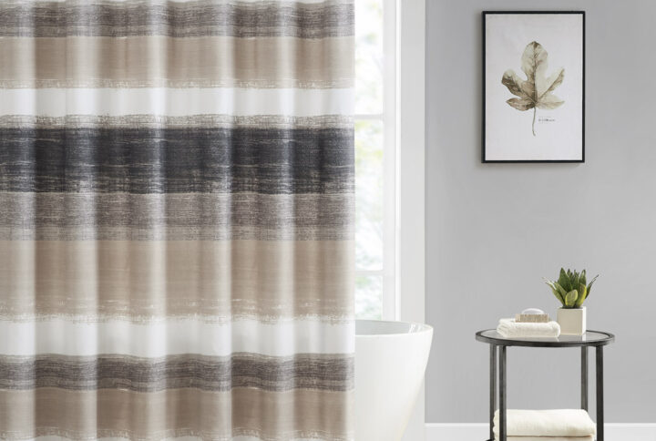 The Madison Park Essentials Saben Shower Curtain provides a modern update to your bedroom. A watercolor stripe print is beautifully displayed on the ultra-soft microfiber Shower Curtain. Bringing the best in health and wellness