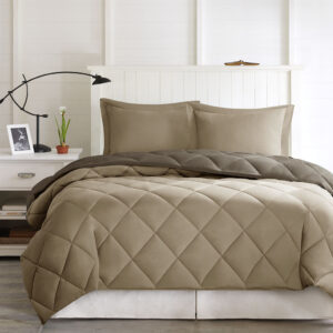 the Madison Park Essentials Larkspur 3M Scotchgard Diamond Quilting Down Alternative Comforter Mini Set will make you never want to get out of bed. This comforter is made from ultra-soft microfiber and features 3M Stain Resistant Treatment that helps release stains easily. The down alternative filling provides extra warmth and softness