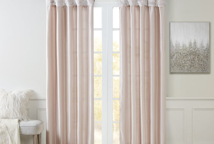 Give your home a decorator’s touch with the Madison Park Emilia Window Curtain. Made from a faux silk fabric