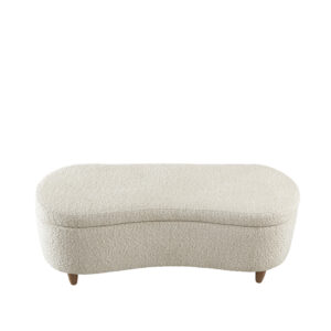 it also has a straight back that fits snugly against a wall or bed. The upholstered bench sits atop solid wood legs