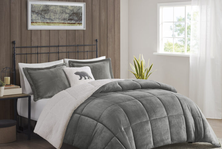 Bring the warmth and comfort of a cabin retreat to your bedroom with the Woolrich Alton Plush to Sherpa Down Alternative Comforter Set. Made from ultra-soft plush and reversing to a cozy berber