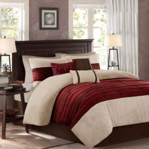 The Madison Park Palmer 7 Piece Comforter Set offers a classic and refined update to your bedroom decor. This transitional style comforter features a pieced microsuede design in rich contrasting red and khaki colors to create an incredibly soft look and feel. The 2 matching shams also flaunt a pieced construction to coordinate with the faux suede comforter. A solid brown bed skirt and 3 decorative pillows with a mix of embroidered designs add the perfect finishing touches to complete this lush traditionally-inspired comforter. Machine washable for easy care