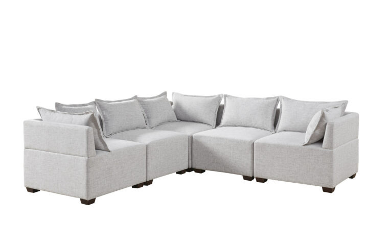 Create a comfortable seating arrangement in your living room with the modern sectional sofa chairs and ottoman. Upholstered in durable and resilient fabric