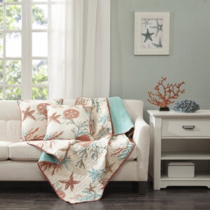 This Madison Park quilted throw creates a casual coastal look. The throw features starfish and coral motifs accentuated with coral and aqua colors and reverses to an aqua blue. It's oversized and overfilled for added comfort and style.