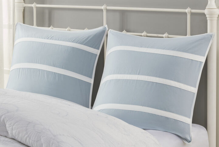 The Harbor House Crystal Beach Euro Sham offers a refreshing accent piece to your bed. This cotton Euro sham features embroidered white striping across the soft blue fabric