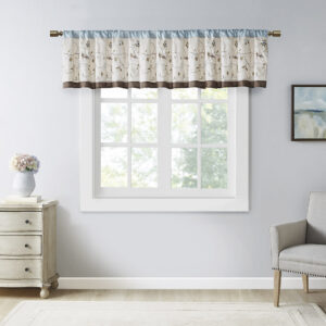 Add simple elegance to any room with the Madison Park Serene Embroidered Valance. This valance features delicate floral embroidery in soft blue and natural hues