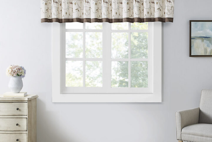 Add simple elegance to any room with the Madison Park Serene Embroidered Valance. This valance features delicate floral embroidery in soft blue and natural hues