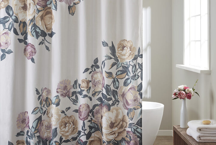 Bring style and life to your bathroom decor with the Madison Park Charisma Cotton Floral Printed Shower Curtain. This shower curtain features a beautiful engineered floral design in feminine blush/ivory/green tones on a ivory contrast ground