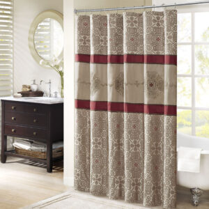 Add a touch of sophistication and elegance to your bathroom with the Donovan shower curtain. This stunning curtain features a bold color-blocked design that is accentuated with intricate embroidery details. The jacquard weave adds depth and texture to the curtain