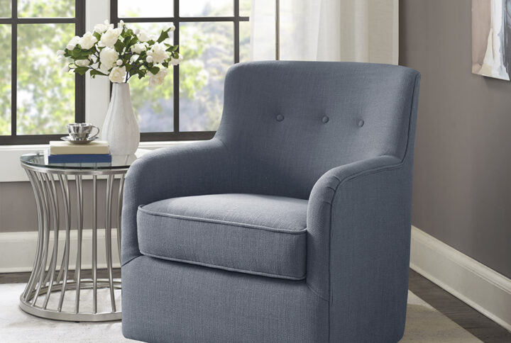 The Madison Park Adele Swivel Chair will add a touch of style and comfort to your home. Upholstered in a blue fabric