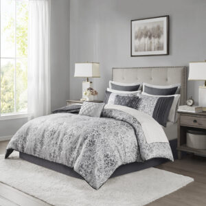 Give your bedroom a touch of elegance with this jacquard comforter set featuring a stunning damask pattern that shimmers due to the metallic threads. This bed in a bag comes with one comforter