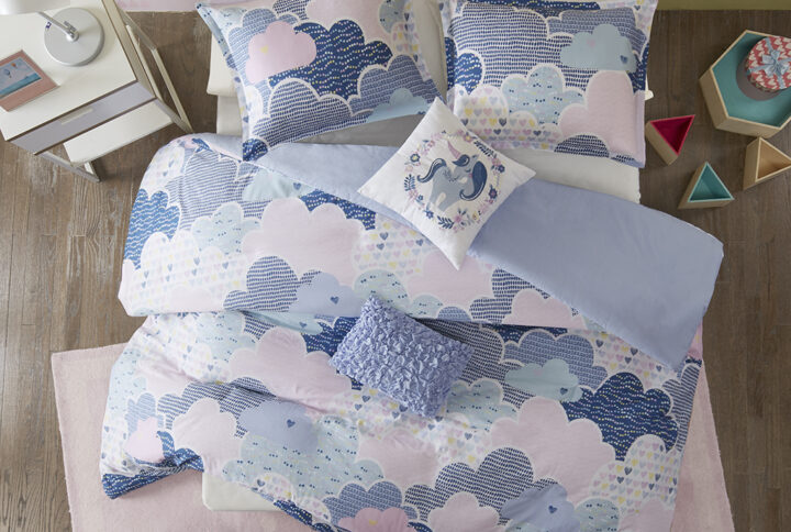 Drift off to dreamland with the whimsical charm of the Urban Habitat Kids Cloud Cotton Printed Duvet Cover Set. The duvet cover and shams (1 in Twin Sizes) showcase a cute and fluffy cloud motif in a soft colorful palette with a solid reverse. An oblong decorative pillow features all-over ruching and the square pillow features an embroidered unicorn. Made from 100% pre-shrunk cotton