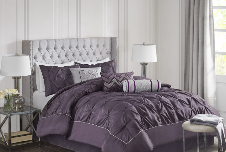 This beautifully tufted bed is from the Laurel bedding collection. Its deep plum coloring makes this set create a statement in your bedroom. The collection is made from 100% polyester polyoni and has pieced fabric sewn together to give this set dimension. It is finished with a smooth edge of fabric that creates a beautiful border around this comforter. Items in the set may come in a rolled or compressed packaging