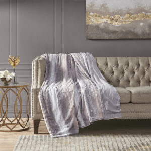 The Madison Park Zuri oversized throw features a luxuriously soft faux fur and reverses to a solid faux mink. This faux fur throw is the perfect modern update and adds a glamorous accent to your home. This throw is machine washable for easy care and OEKO-TEX certified