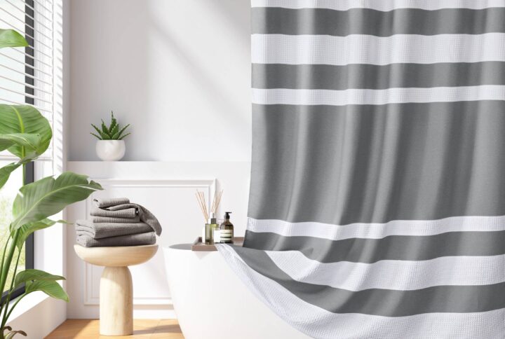 Update your space with the Madison Park Spa Waffle Shower Curtain with 3M Treatment. Featuring a fresh and updated stripe design