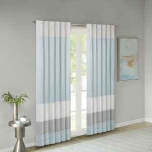 Amherst's modern color block design is a simple way to add style to your room. This window panel features color block stripes in soft hues of aqua