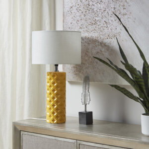 Make a statement in your living room with the eye-catching style of the 510 Design Macey Geometric Ceramic Table Lamp. This round table lamp flaunts a patterned ceramic base that adds dimension and texture to the design