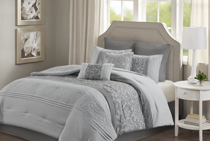 The 510 Design Ramsey Embroidered 8 Piece Comforter Set introduces a graceful elegance to your bedroom decor. A pieced embroidery design with quilting and pintuck details