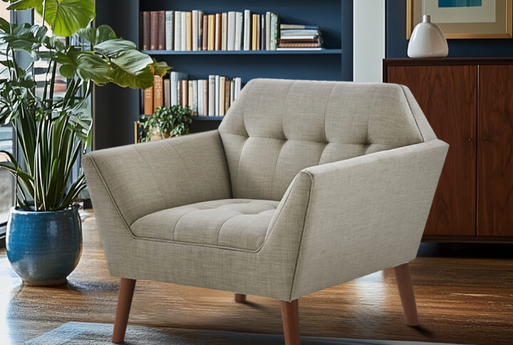 Elevate your living area with the mid-century allure of the INK+IVY Newport Upholstered Armchair. Featuring a wide 37-inch profile and a striking angular silhouette