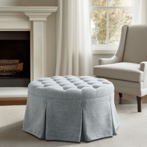 Complement your living room decor with the Martha Stewart Terri Button Tufted 32" Round Ottoman. This round ottoman features a button tufted top with an elegantly pleated skirt to create a stunning transitional look. Perfect for accenting your living room