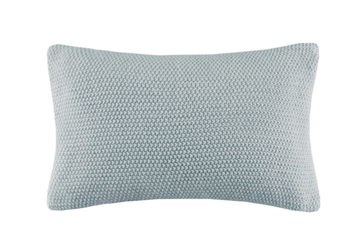 The INK+IVY Bree Knit Oblong Pillow Cover offers a simple and cozy addition to your living room or bedroom decor. This knit pillow cover is made from ultra-soft acrylic to create a casual cottage look. A hidden zipper closure provides a clean finished edge to the design. Machine washable for easy care