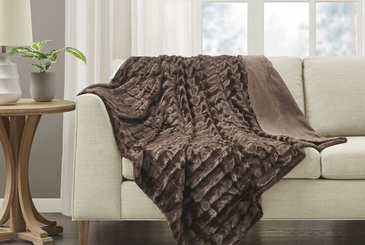 Wrap yourself in the lush comfort of the Madison Park Duke Long Fur Throw. The ultra-soft faux fur face provides comfort and coziness